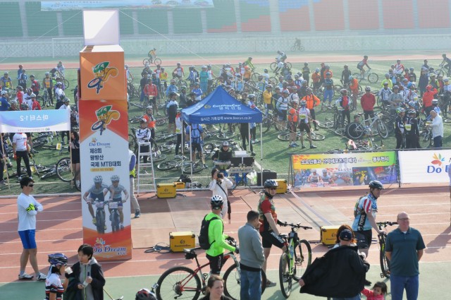 Biking for the alliance at the 8th Annual Wangbang International Mountain Bike Match.
