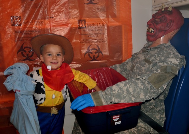 Trick-or-treaters line up for Div. West's first Ft. Bliss Trunk-or-Treat
