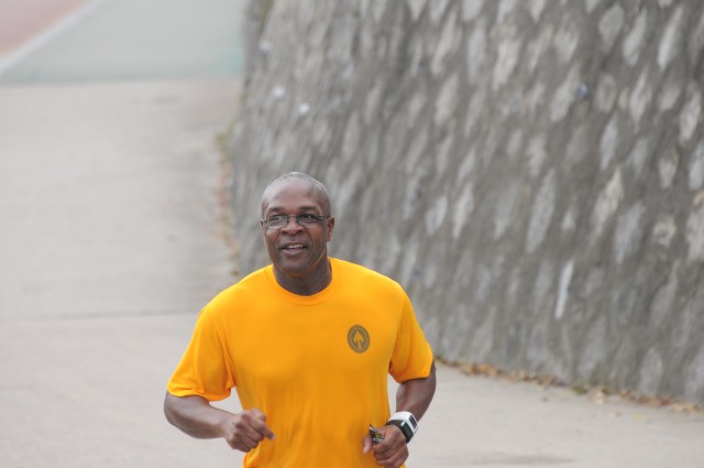 Second Infantry Division Soldier, Sgt. Maj. Charles Friend from Grand Rapids, Michigan runs his first marathon