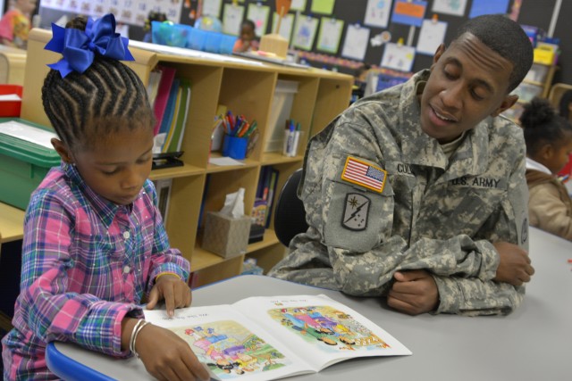 Soldier surprises daughter with early return from deployment