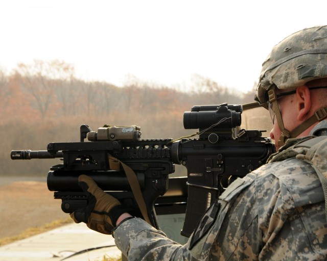 US Army Soldiers shoot for Japan Marksmanship Badge during Orient Shield 14