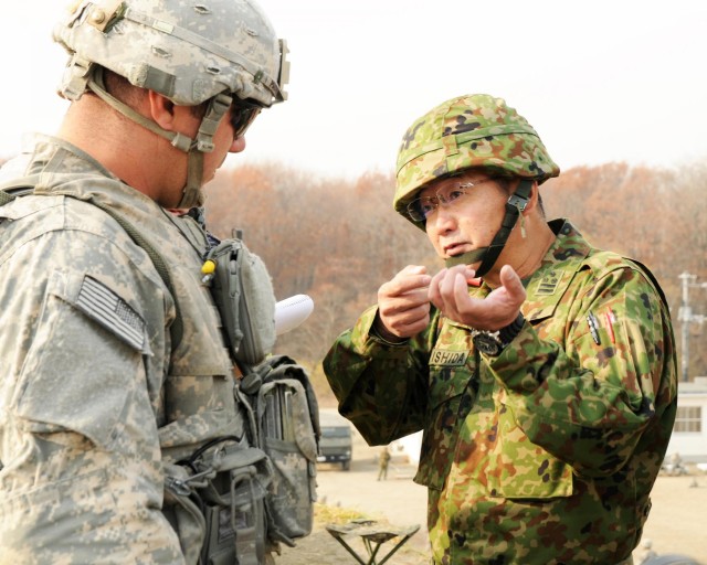 US Army Soldiers shoot for Japan Marksmanship Badge during Orient Shield 14