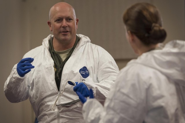 Service members, civilians train to defend against infectious diseases