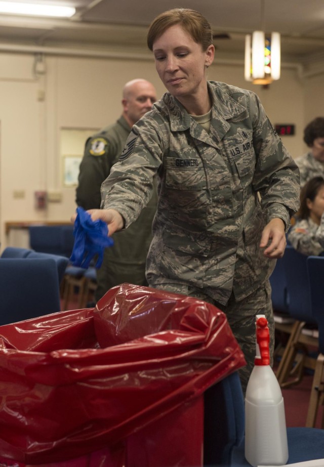Service members, civilians train to defend against infectious diseases