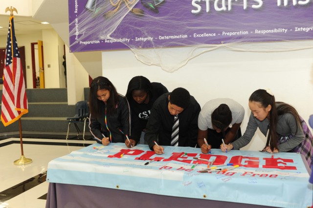 Red Ribbon Week; youth members sign pledge