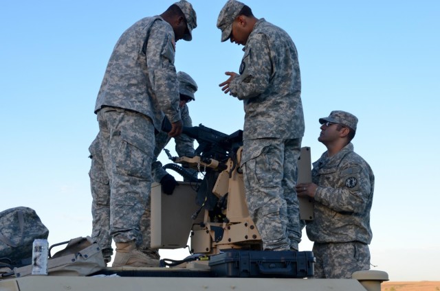 Soldiers mount CROWS during familiarization range