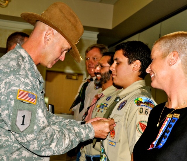 COL Jacobi pins Eagle Scout medal