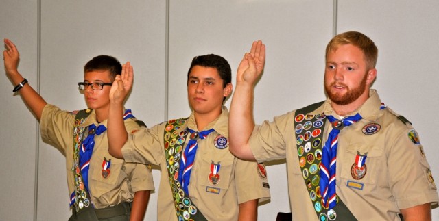 Eagle Scouts make Scout sign