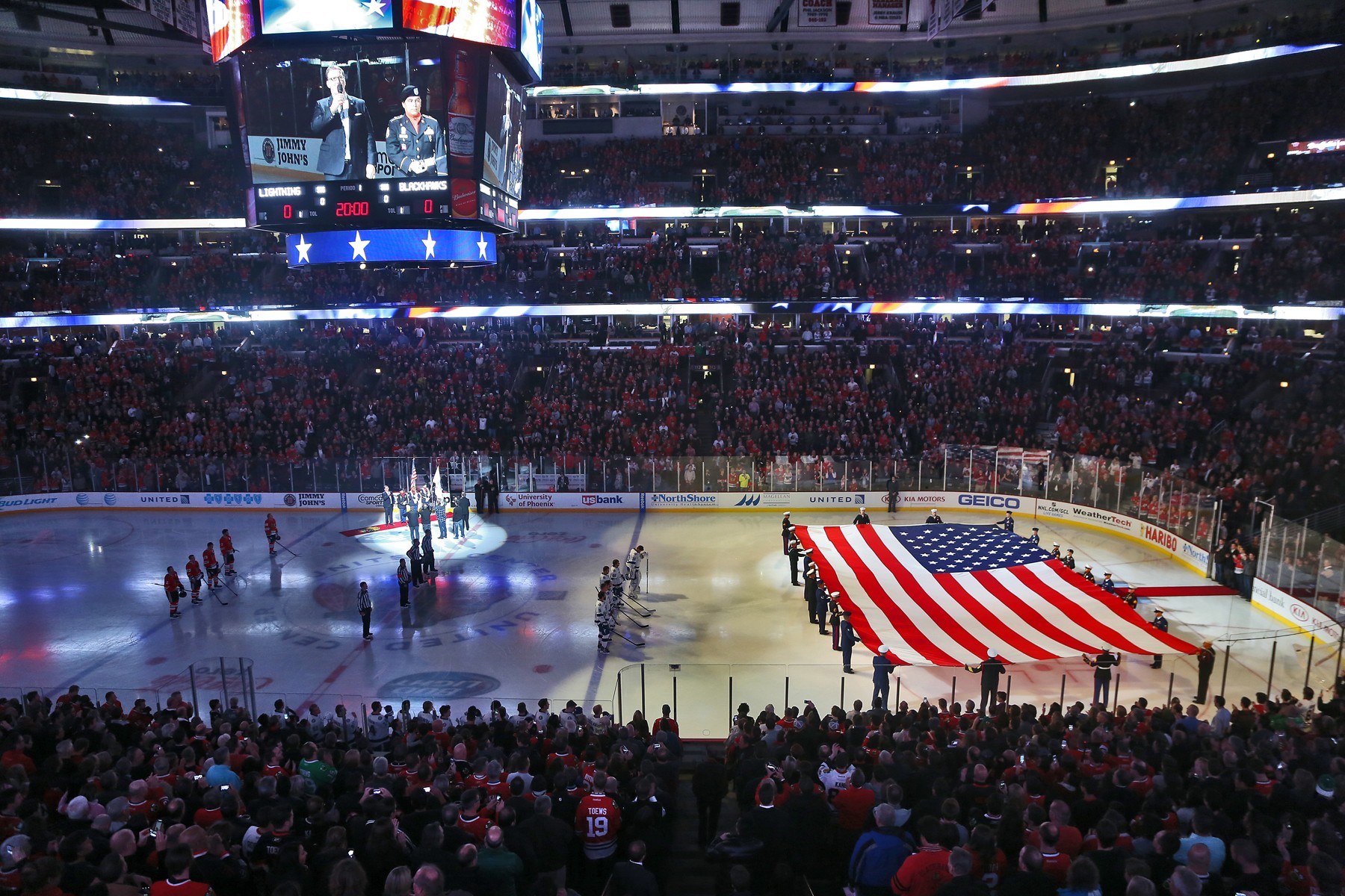 Reserve color guard NCOs honor World War II veterans during NFL game, Article