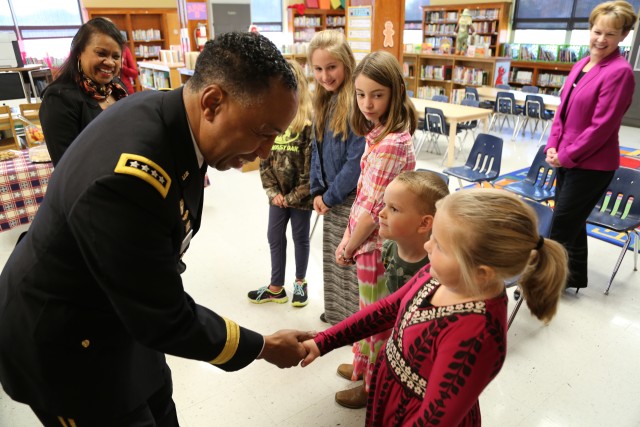 Via speaks to students at Carver Elementary