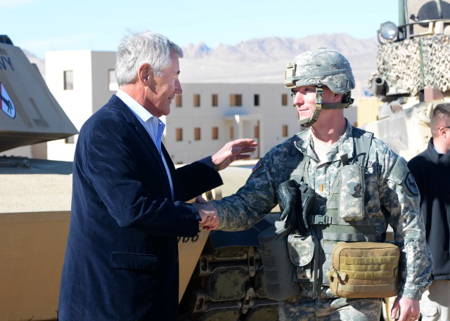 Secretary of Defense Chuck Hagel greets 11th ACR officer