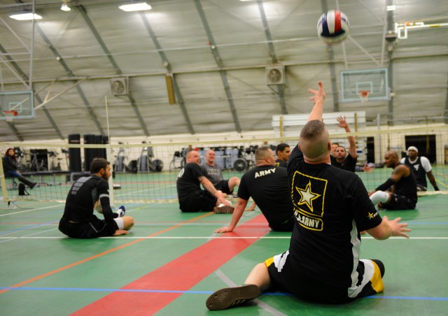 Confident men's sitting volleyball team ready to compete