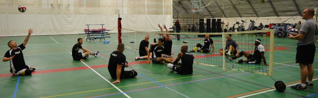 Confident men's sitting volleyball team ready to compete