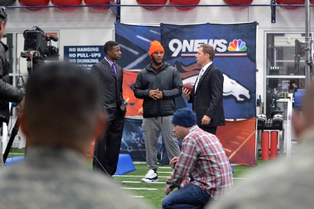 'Broncos Huddle' Soldiers, Airmen attend show