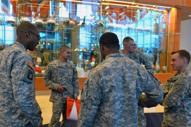 'Broncos Huddle' Soldiers, Airmen attend show