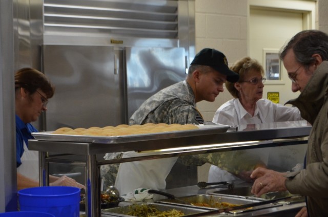 Crane Army Commander Serves Thanksgiving meal to employees