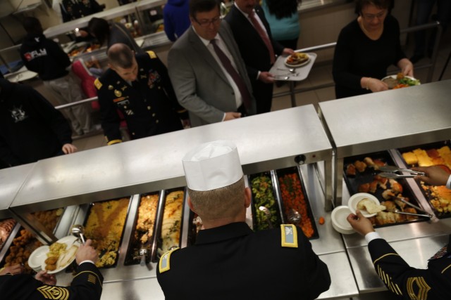 Senior Leaders serve Soldiers and family member a Thanksgiving meal