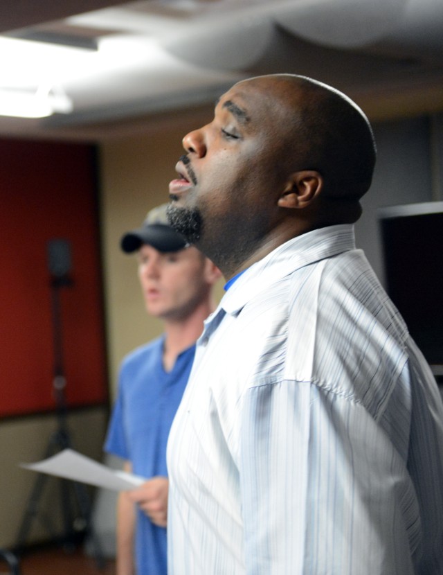 Ron Henry and Staff Sgt. Michael Joseph rehearse