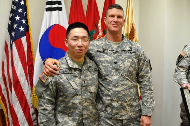 1st Lt. Kusumoto gets pinned