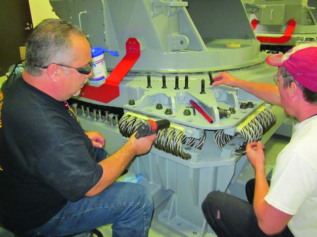 Army technicians support Navy missile launcher