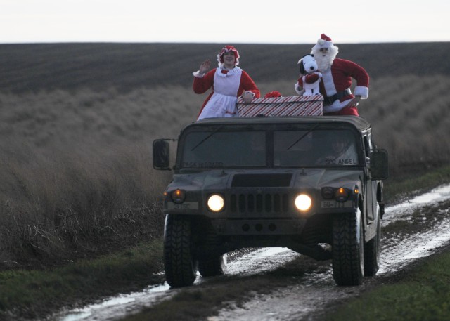 Santa jumps to deliver presents to KMC kids