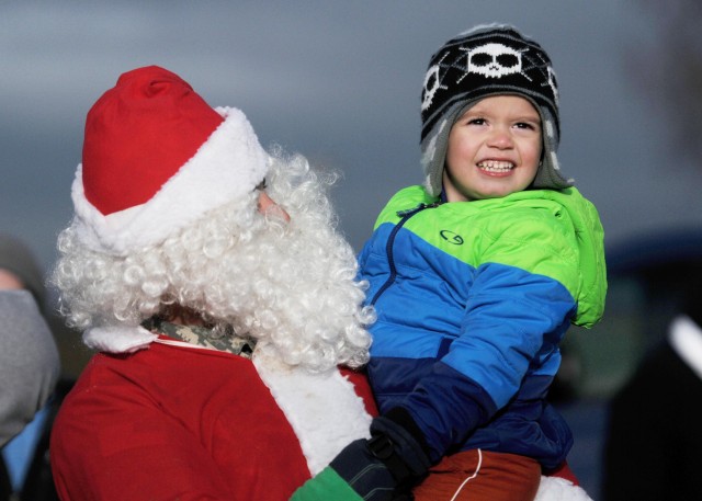 Santa jumps to deliver presents to KMC kids