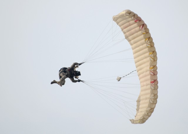 Santa jumps to deliver presents to KMC kids