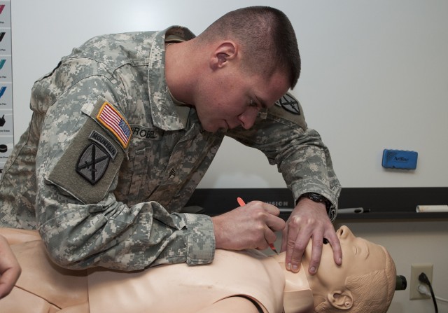 Active-duty, Reserve Soldiers hone skills during Mountain Medic Course