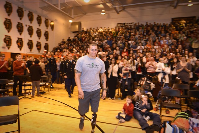 Wounded warrior receives honor from Chicago-land high school community
