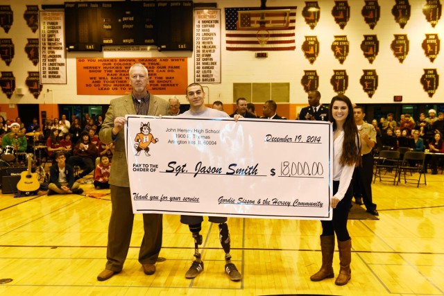 Wounded warrior receives honor from Chicago-land high school community