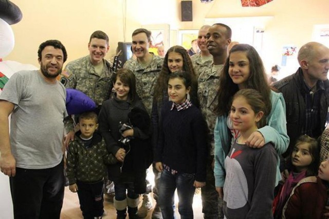 Soldiers celebrate Christmas at a Kosovo orphanage