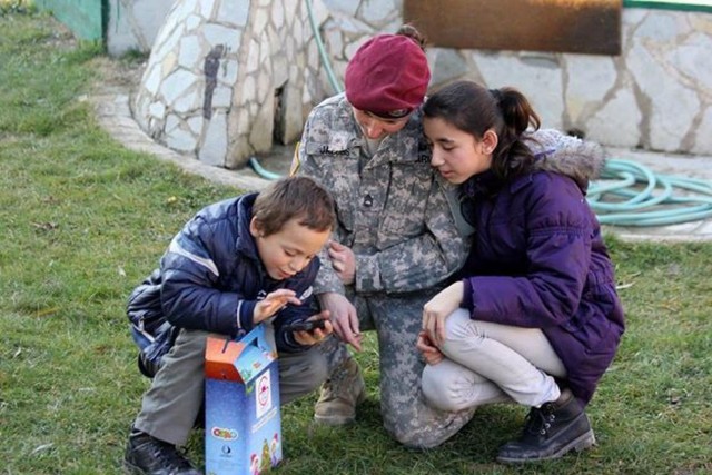 Soldiers celebrate Christmas at a Kosovo orphanage