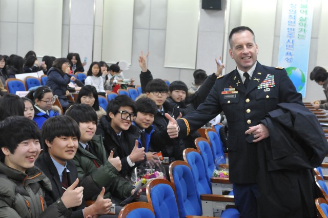 Soldiers "High Five," give back to local community