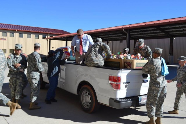 3-2 ADA Soldiers Load Donated Food