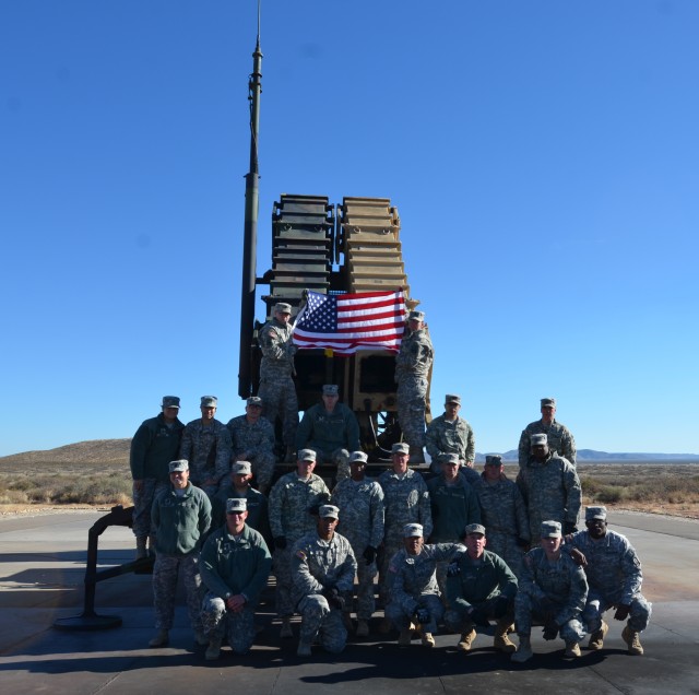A Battery Soldiers pose after successfully completing a Patriot Live-Fire