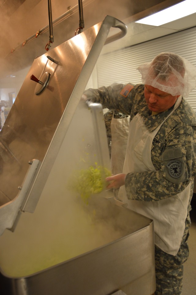 Capt. Chase pours celery into vat