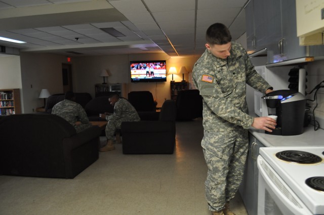 Soldiers gather in their new shared living space
