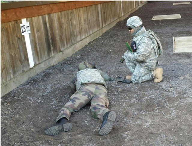 Lt Guy shoots M16-A2 rifle for the first time and qualifies