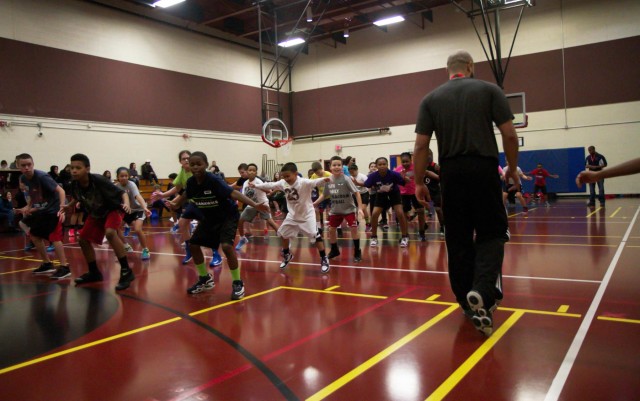 Sue Bird gets hands-on with military children in free basketball clinic