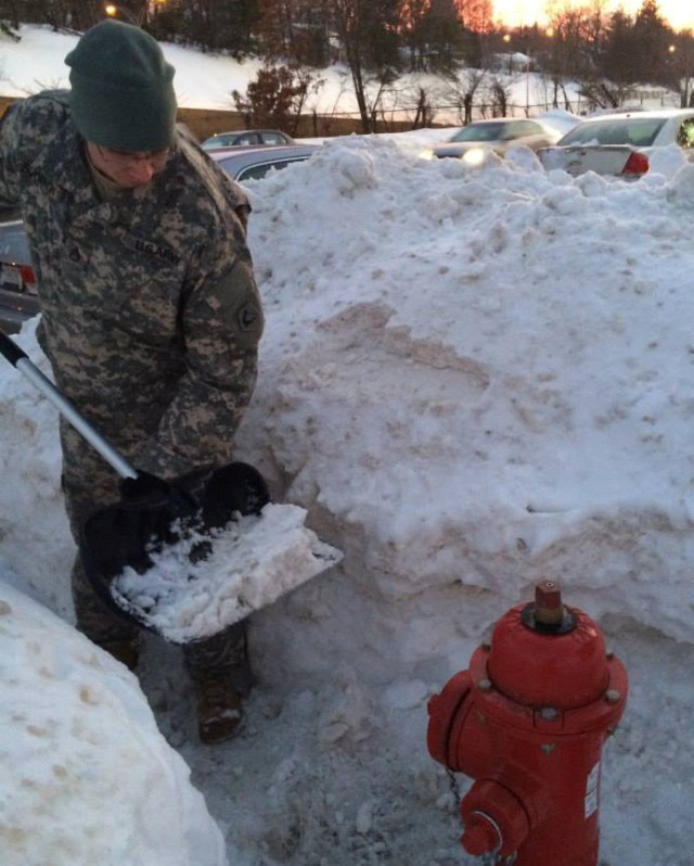 Massachusetts deploys Guard members to clear snow