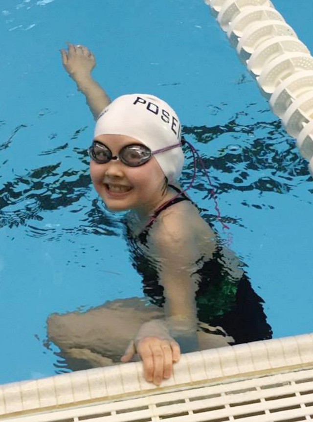 Virginia team swims laps for Wounded Warriors Project