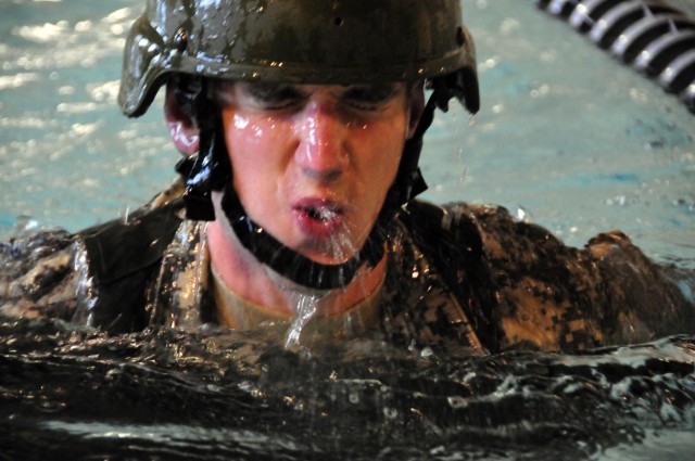 Candidates conduct water survival training