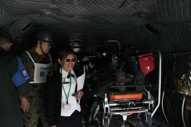 Col. Thirsa Martinez inspects Chinook MEDEVAC aircraft