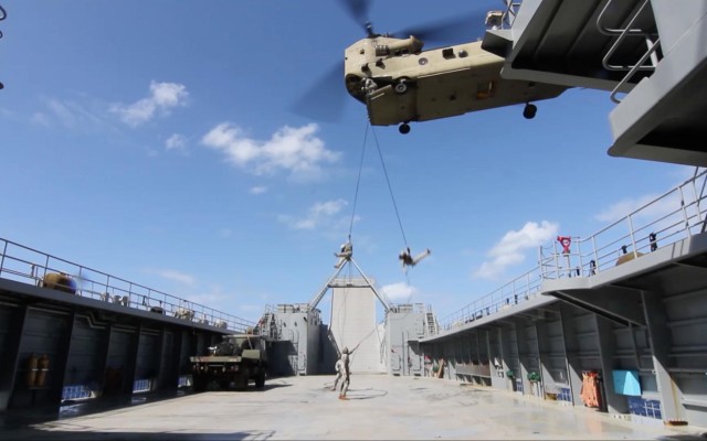 Pacific Waterborne, Air Assault, Aviation Soldiers work together during maritime rappel/sling load operations