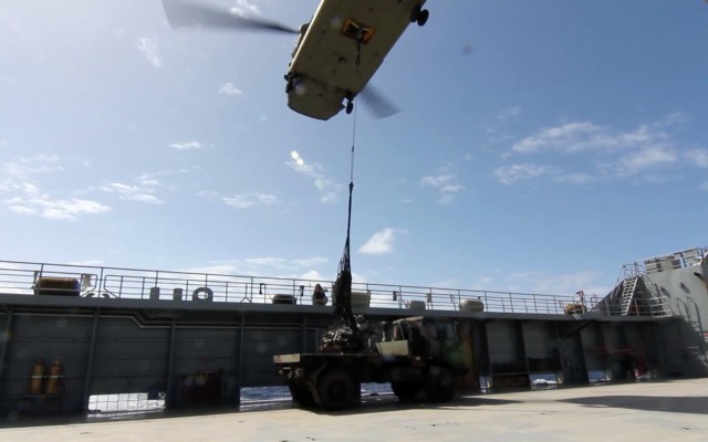 Pacific Waterborne, Air Assault, Aviation Soldiers work together during maritime rappel/sling load operations