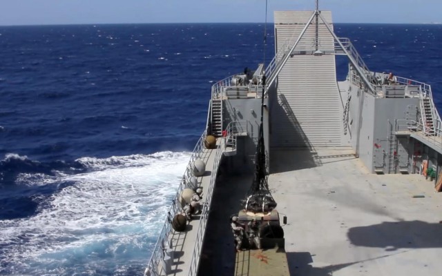 Pacific Waterborne, Air Assault, Aviation Soldiers work together during maritime rappel/sling load operations