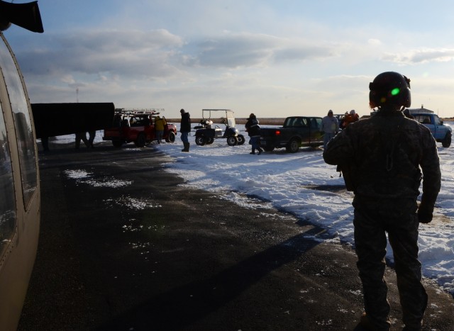 Virginia National Guard aviators deliver supplies to iced-in Tangier Island