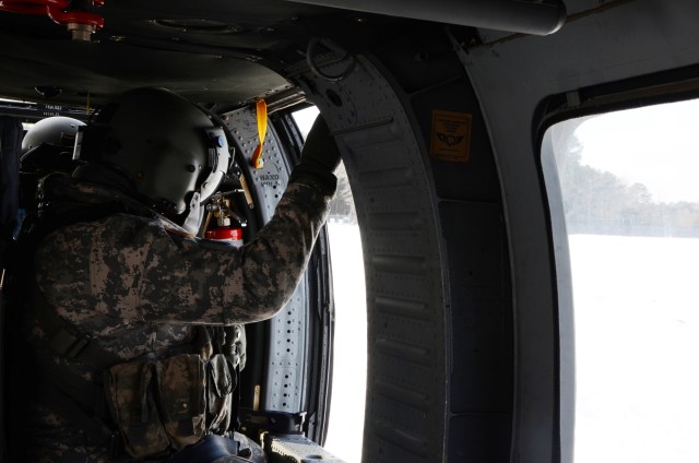 Virginia National Guard aviators deliver supplies to iced-in Tangier Island