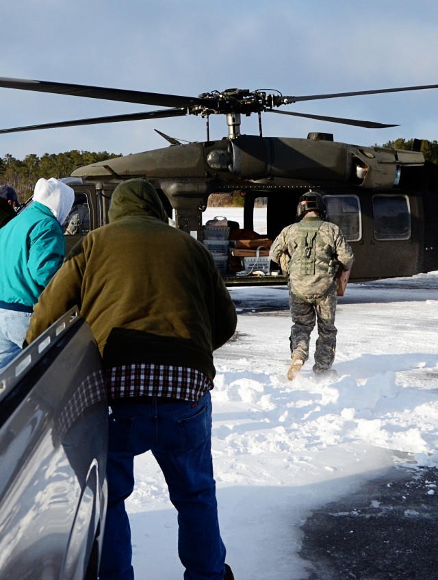 Virginia National Guard aviators deliver supplies to iced-in Tangier Island