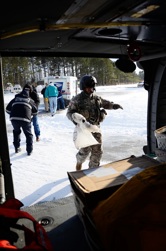 Virginia National Guard aviators deliver supplies to iced-in Tangier Island